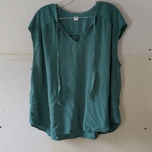 A sleeveless top.